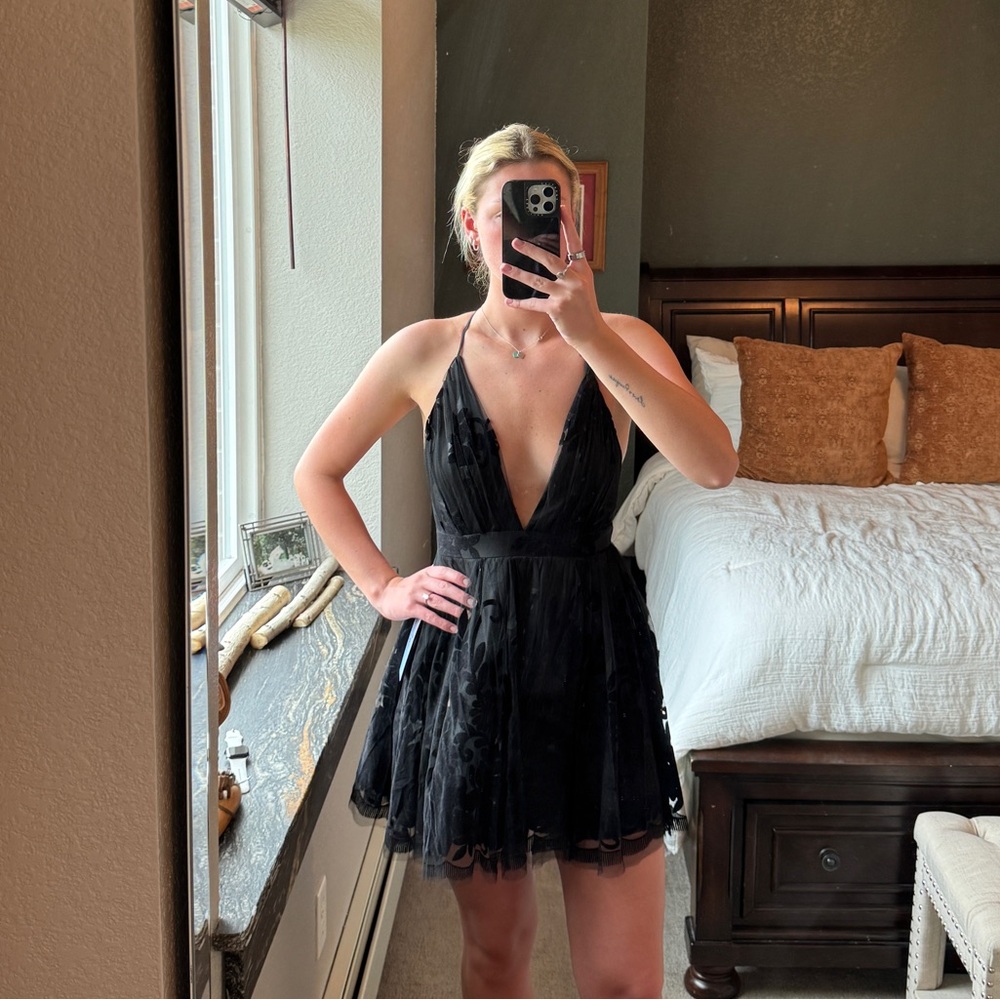Black Mini PromGirl “Luxxel” Dress with cross back